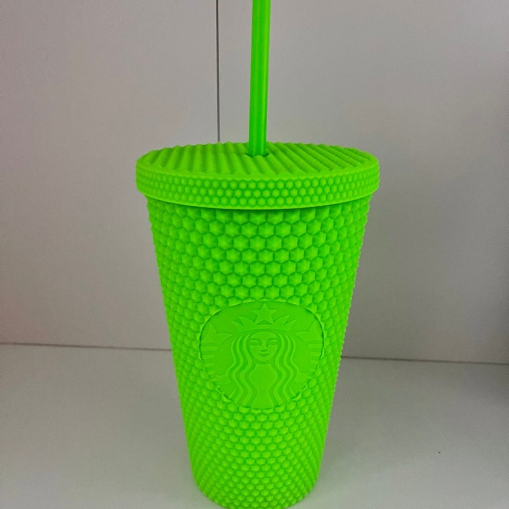 Bright green Starbucks cup